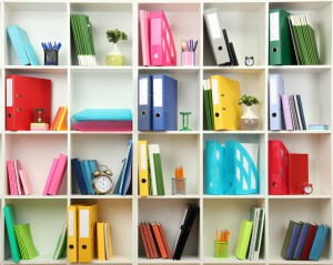bookcase full of office supplies